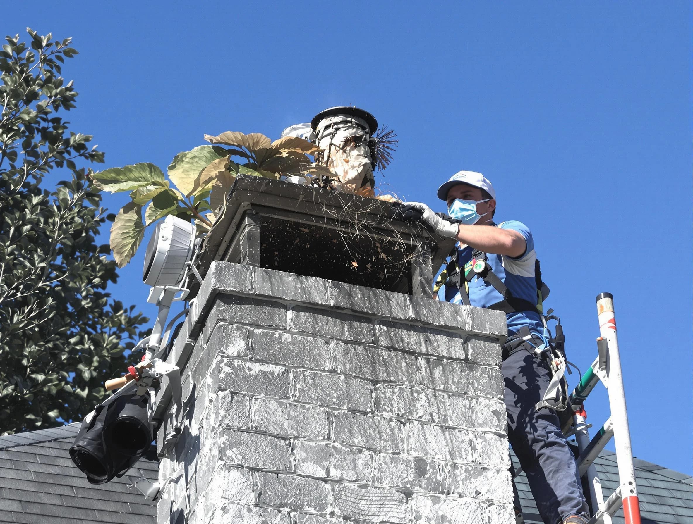 Apache Junction Chimney Sweep specialist performing chimney cleaning in Apache Junction, AZ